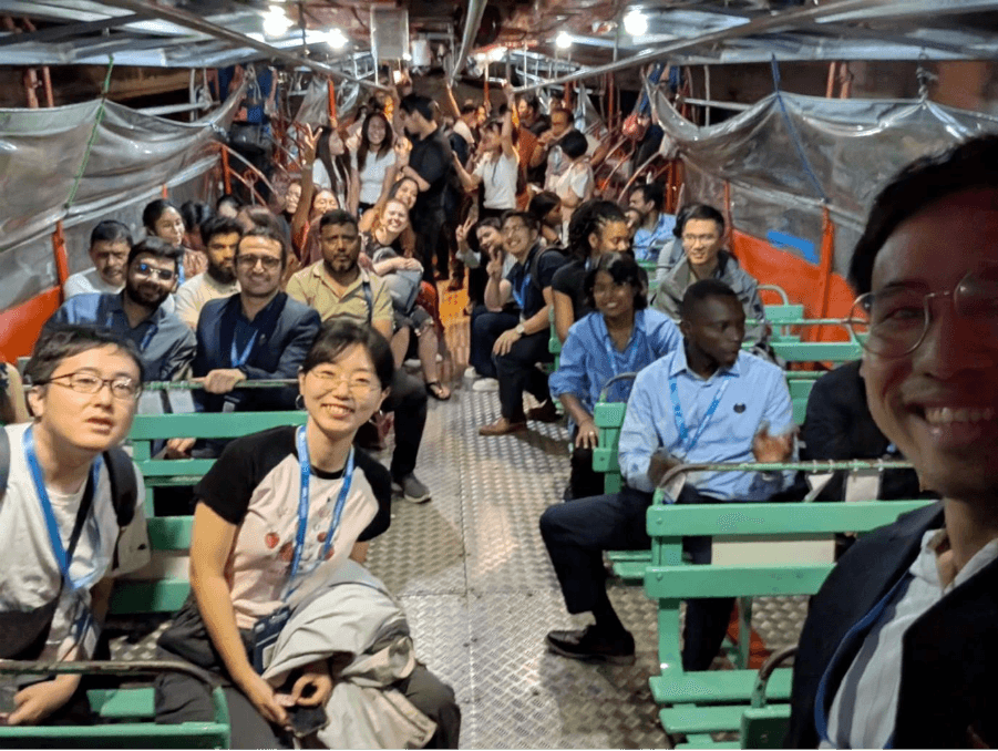 A group of people sitting on a bus AI-generated content may be incorrect_.png