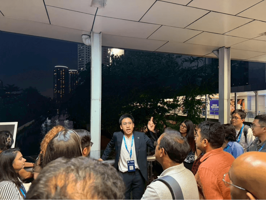 A person speaking to a group of people AI-generated content may be incorrect_.png